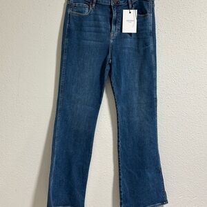 slide slit mid ride boot cut jeans size 31 Hidden jeans NWT Ryan style.